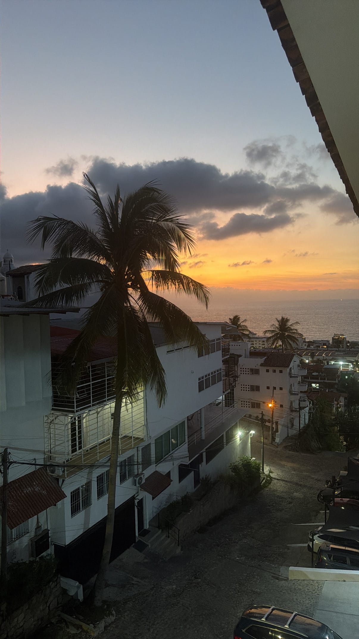 View from airbnb in 5 de December at sunset with ocean view