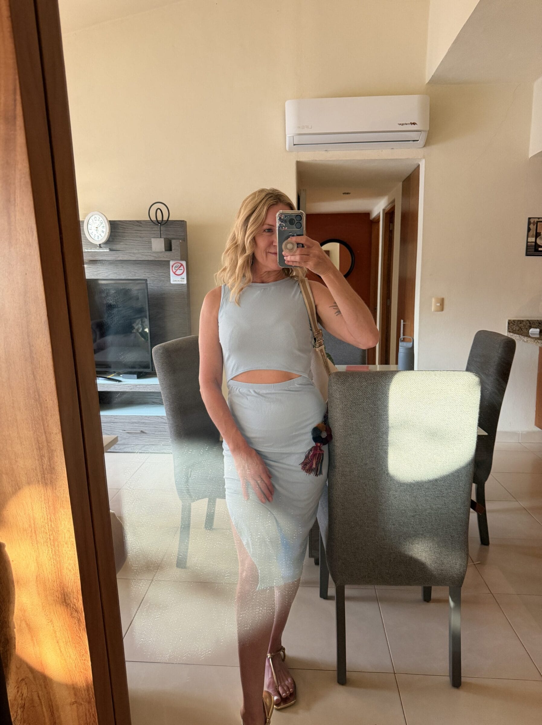 Woman taking selfie inside of airbnb in Puerto Vallarta