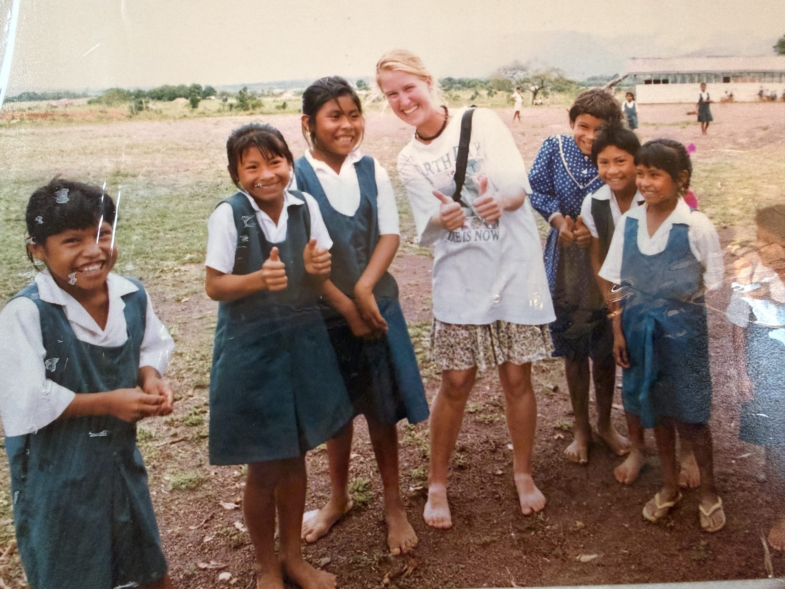 Otehlia with a group of students in a village in Guyana circa 1993